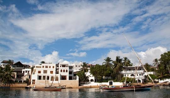 Dhow sailing off the coast at Lamu